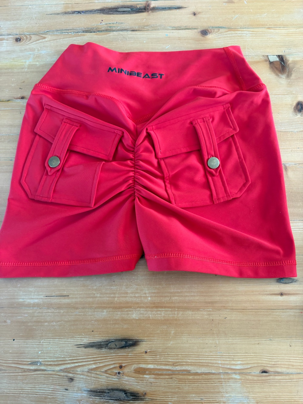 MINIBEAST Women's Athletic Cargo Shorts in Red